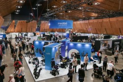 Different high angle view of the Expo Hall - booths, attendees looking around