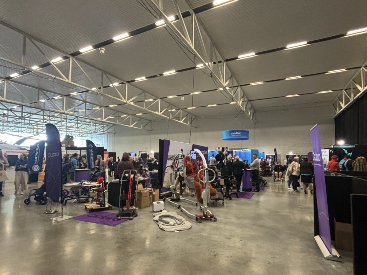 Different angle of Expo Hall - booths, expo cafe, powerwheel chairs, attendees