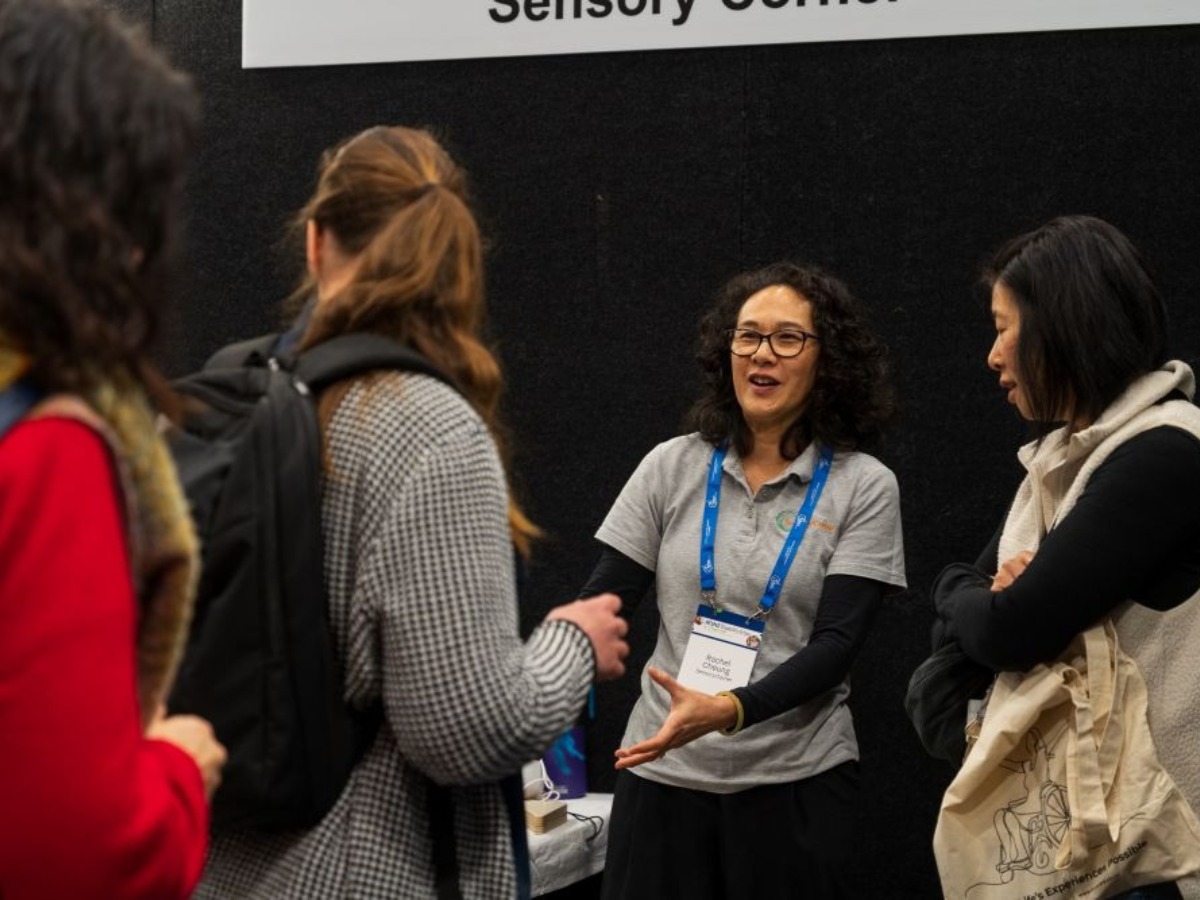Another angle of the Expo Hall - attendees, booths
