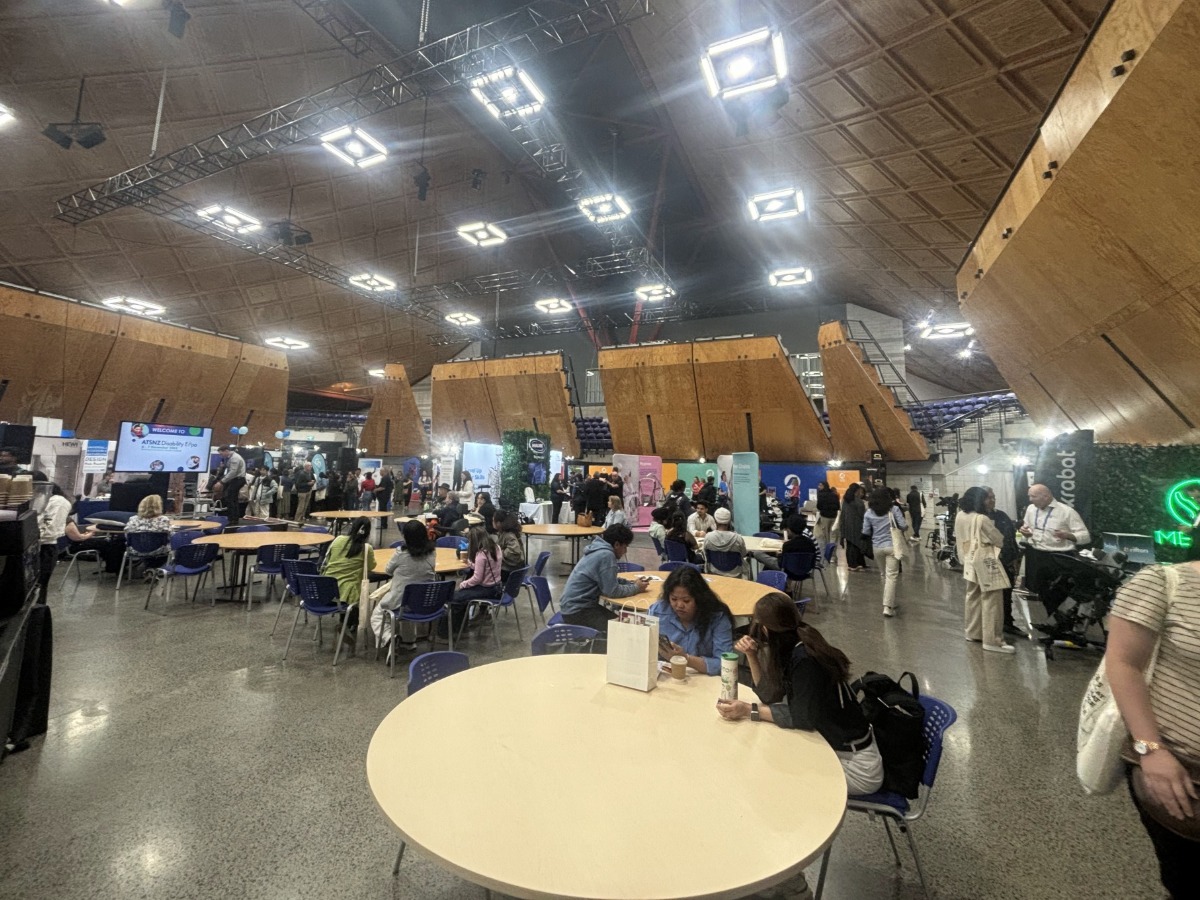 Expo Hall - Medifab booth in the middle with power wheelchairs