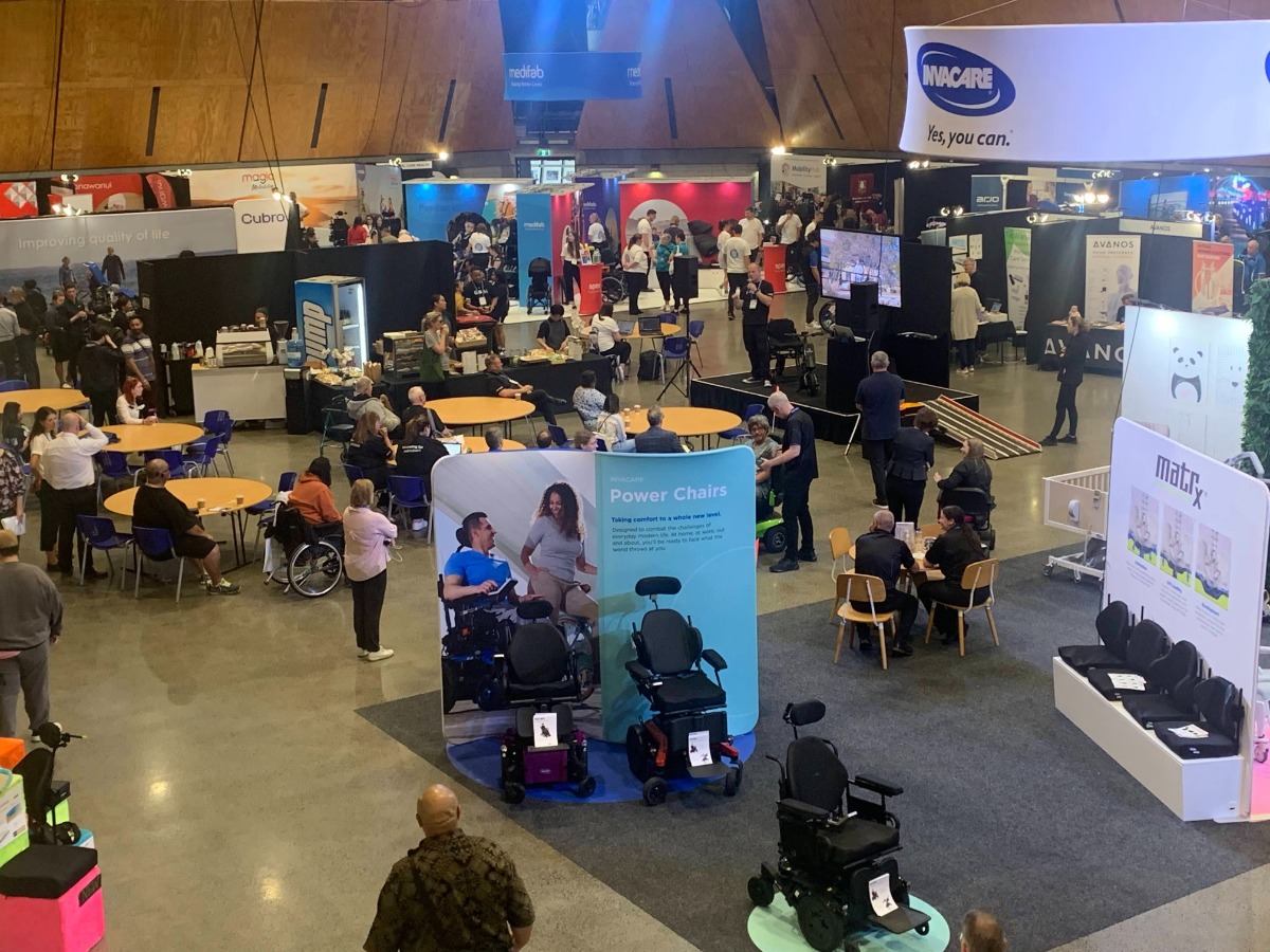 Another angle of the Expo Hall - attendees, booths