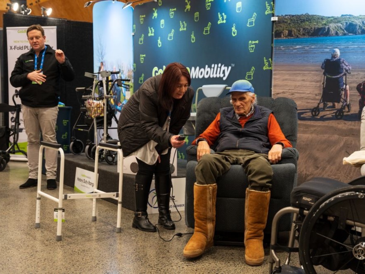 Different angle of Expo Hall - booths, expo cafe, powerwheel chairs, attendees