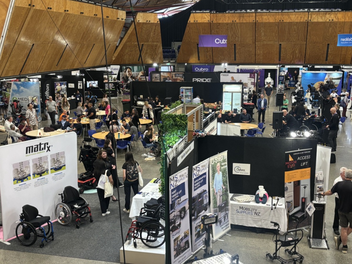 Different angle of Expo Hall - booths, expo cafe, powerwheel chairs, attendees