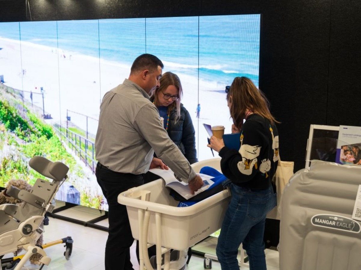 Another Expo Hall angle, with Pride Mobility Centre with lazyboy chairs 