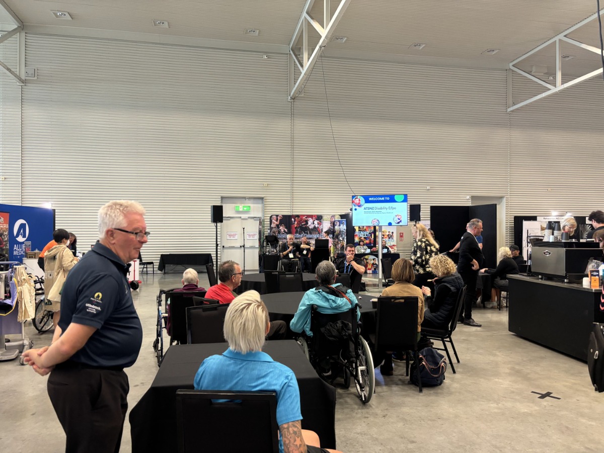 Expo Hall - Medifab booth in the middle with power wheelchairs