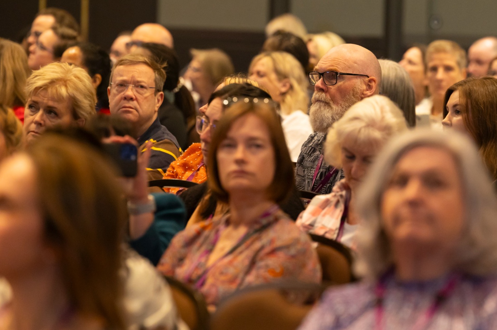 Conference delegates listening to the speaker.