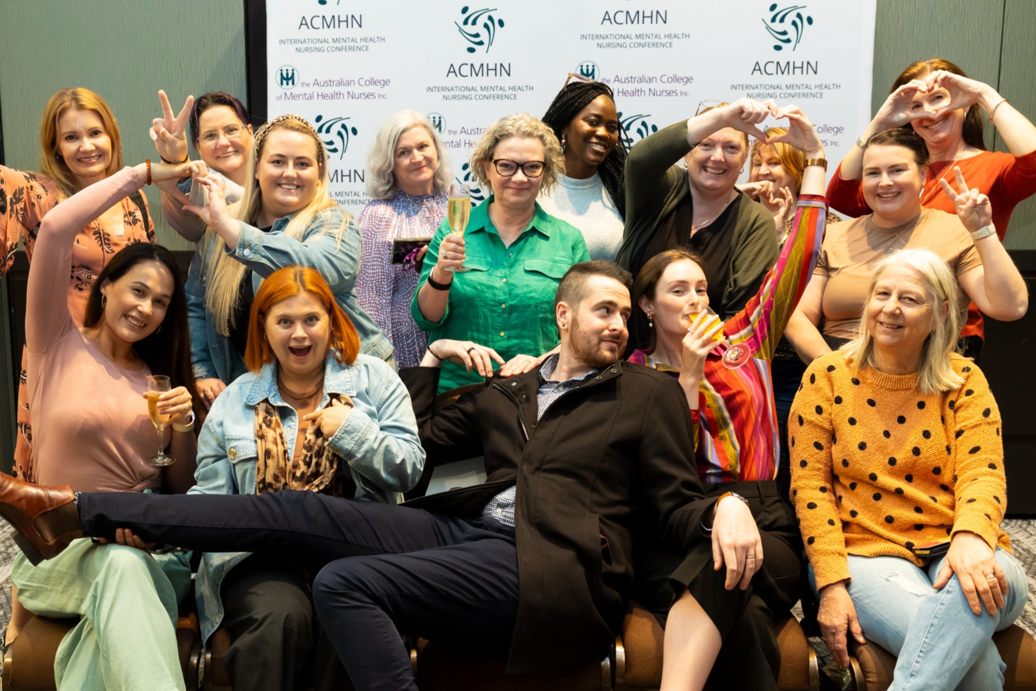 Group of 15 people gathered to take a fun photo. 