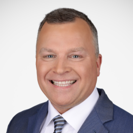 Headshot of James Wells