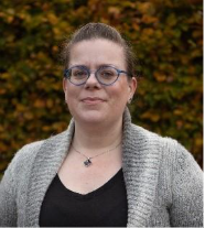 A person wearing blue glasses  AI-generated content may be incorrect.