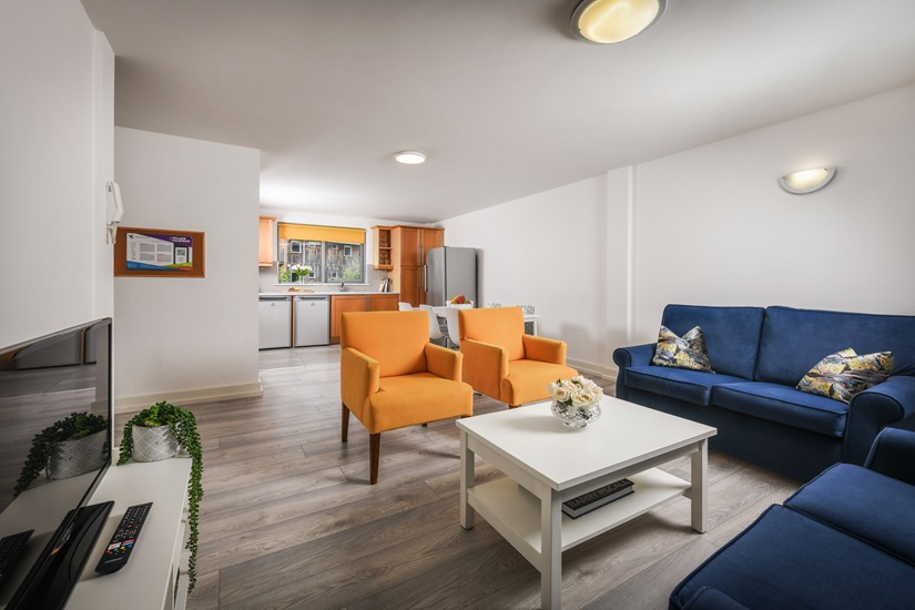 Living room and kitchen of on campus apartment