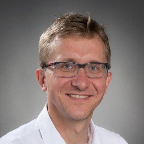 Headshot image of Simon Sedej